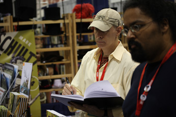 Mark Schultz and James Walker II at the Flesk Booth.