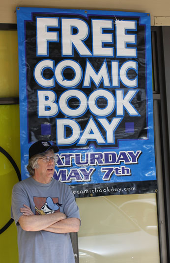 Hijinx owner Neil Farris welcoming people to Free Comic Book Day at his store on May 7, 2011.