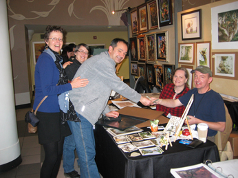 Happy moment 2. Giving money to Larry McDougall after buying one of his enchanting watercolor paintings. (Left to right: Anita, Jean, Petar, Pat Ann and Larry)