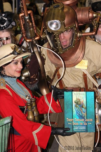 Happy fans posing with their new Twenty-Thousand Leagues Under the Sea book including a fresh sketch from Gianni at the 2009 WonderCon.